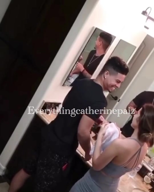 Catherine Paiz and boyfriend in bathroom